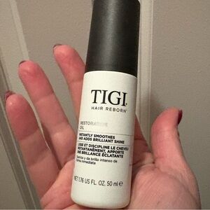 TIGI Hair Reborn Restorative Oil - Black and White Bottle